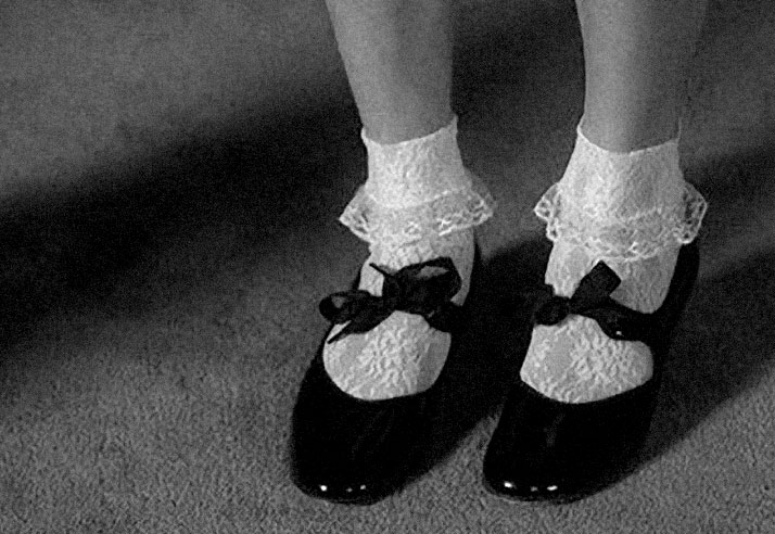 black and white Inspiration friday image of a girl in cute black shoes