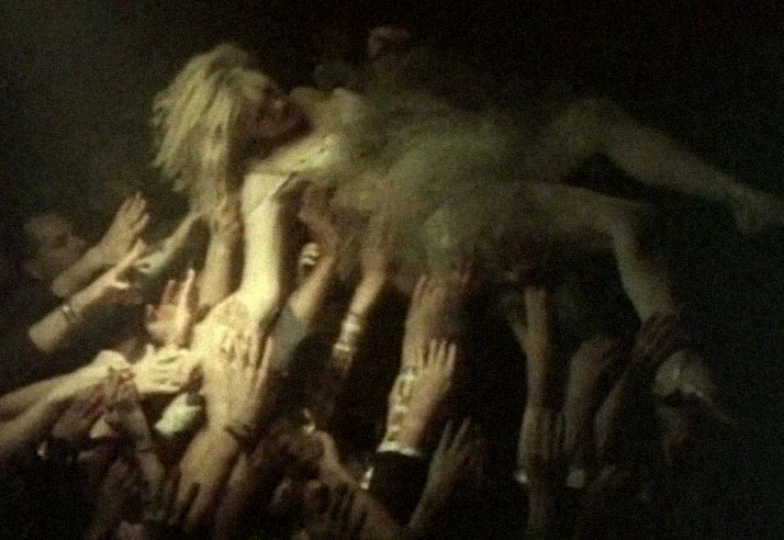 a ghostly Inspiration friday of a girl crowd surfing