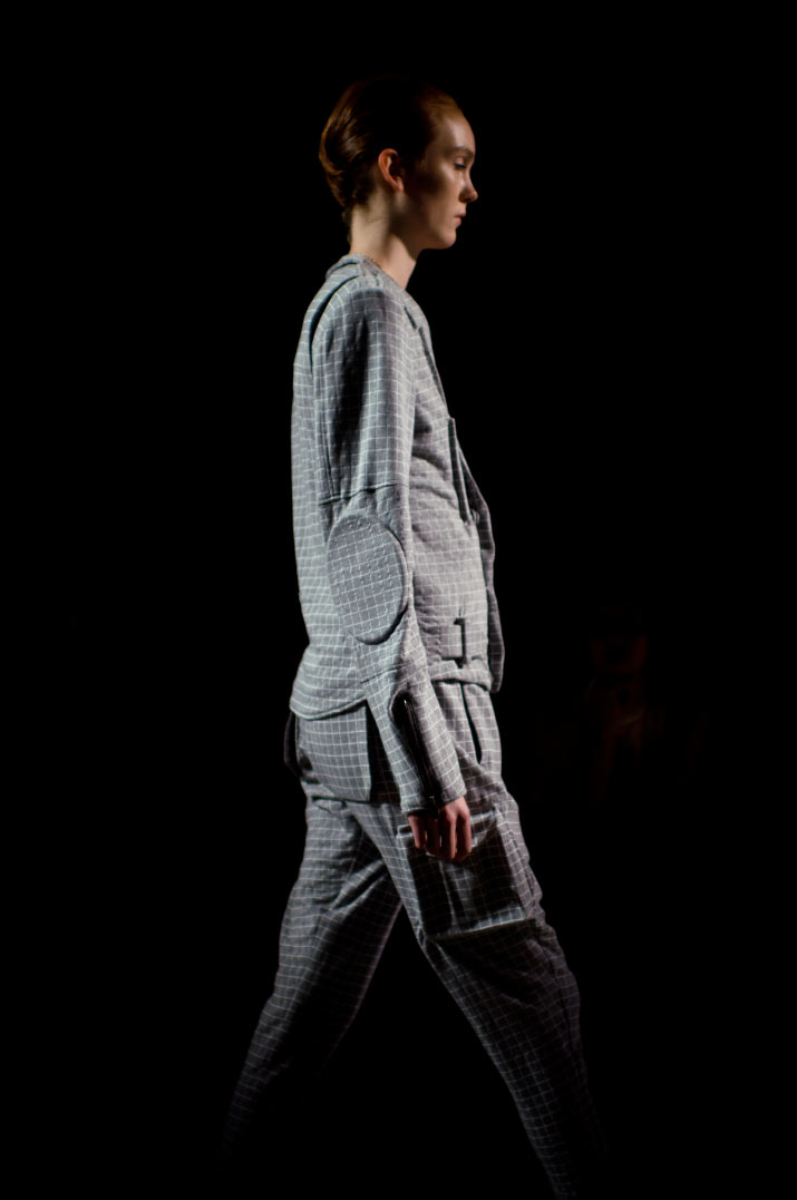 Anrealage Spring 2012 Photograph by Fashion Artist Danny Roberts of a Beautiful silhouette of Fashion model in a grey checked jumpsuit