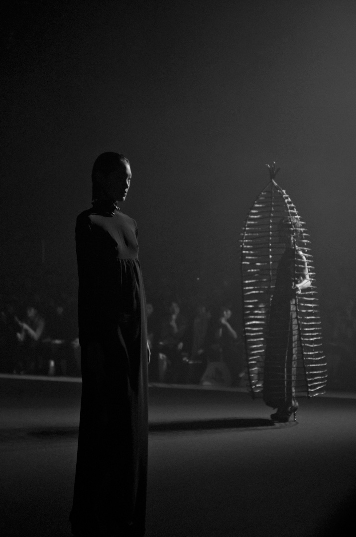 Christian Dada Spring 2012 Tokyo Fashion Week Picture by Fashion Photographer Danny Roberts of a model in a dress and a model in life size bird cage from the Christian Dada Spring 2012 show during Tokyo Fashion Week