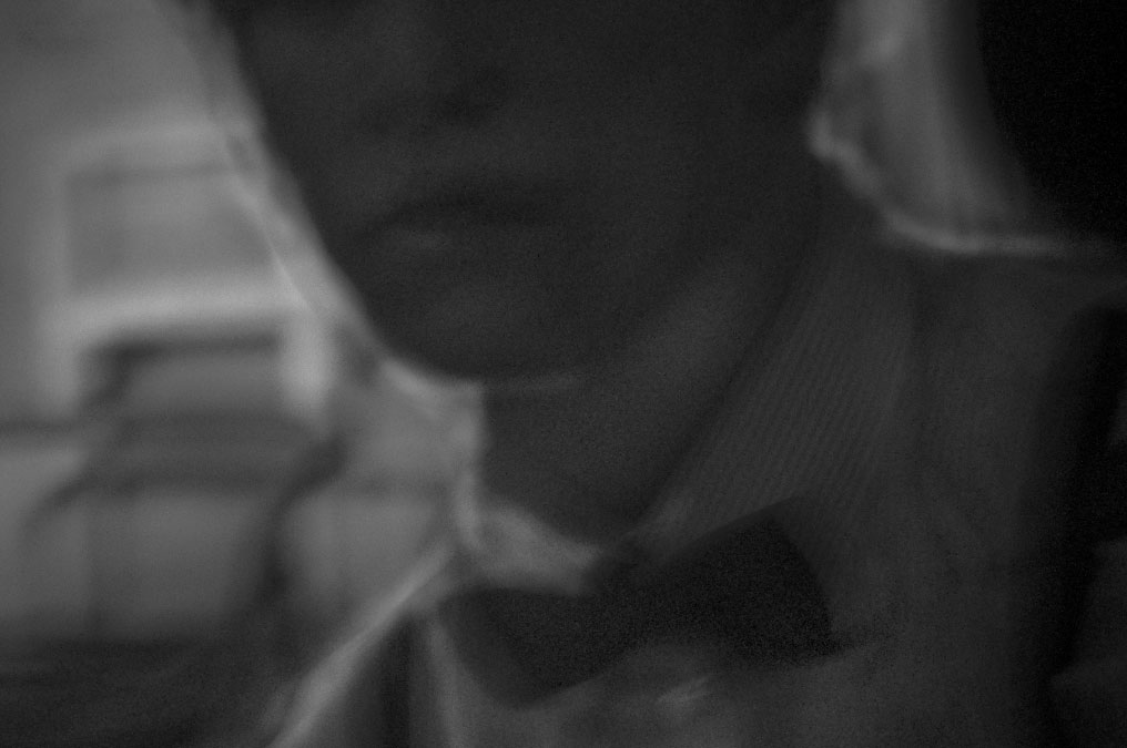 This is a Self Portrait Danny Roberts did of himself he is wearing the bow tie